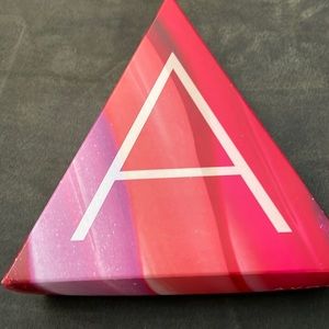 Avon box - lip gloss, nail polish, perfume and brightening serum - NEW